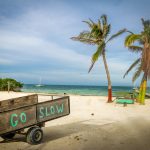 Wood Cart with Go Slow message at Caye Caulker - Belize