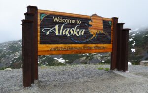 Welcome to Alaska sign on the Canadian / USA border near Skagway